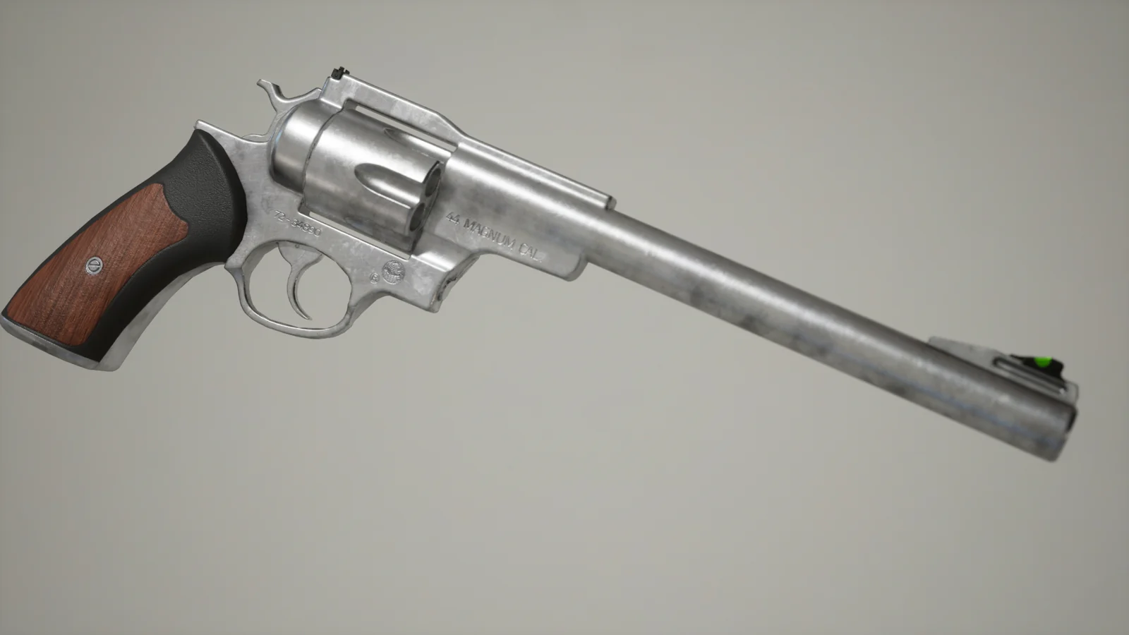 Side view of the same long-barrel revolver against a gray studio background.